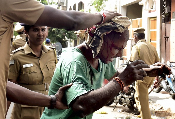 PHOTOS: Police Use Force To Break Chennai Marina Jallikattu Protest