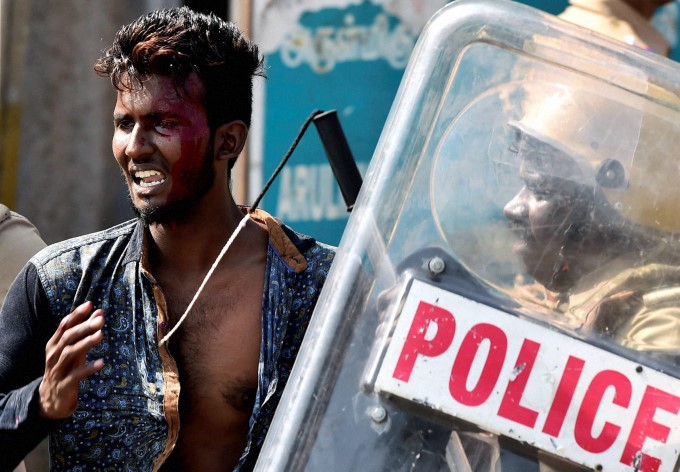 PHOTOS: Police Use Force To Break Chennai Marina Jallikattu Protest