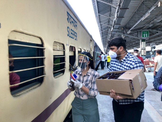 Migrants wait to board a Shramik train at Chennai Central Railway Station