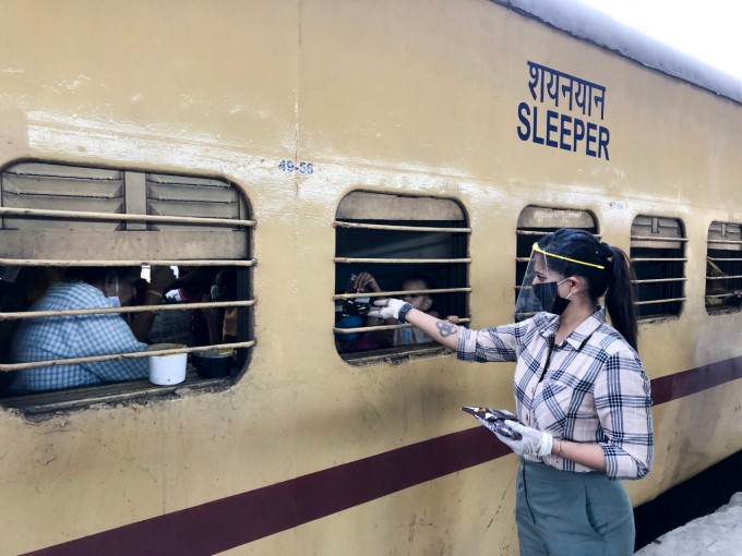 Migrants wait to board a Shramik train at Chennai Central Railway Station