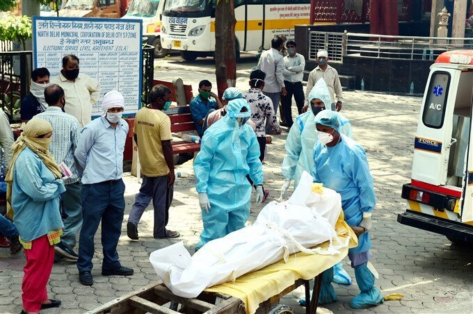 കോവിഡ് മരണം വര്‍ധിക്കുന്നു, രാജ്യത്തിന്റെ വിവിധ ഭാഗങ്ങളില്‍ നിന്നുള്ള സംസ്‌ക്കാര ചടങ്ങുകളുടെ ചിത്രങ്ങള്‍