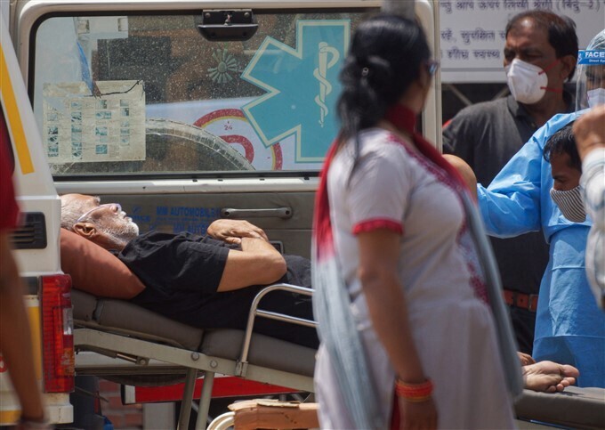 കൊവിഡ് രണ്ടാംതരംഗത്തിന്റെ ഭീകരത വ്യക്തമാക്കുന്ന ചിത്രങ്ങള്‍