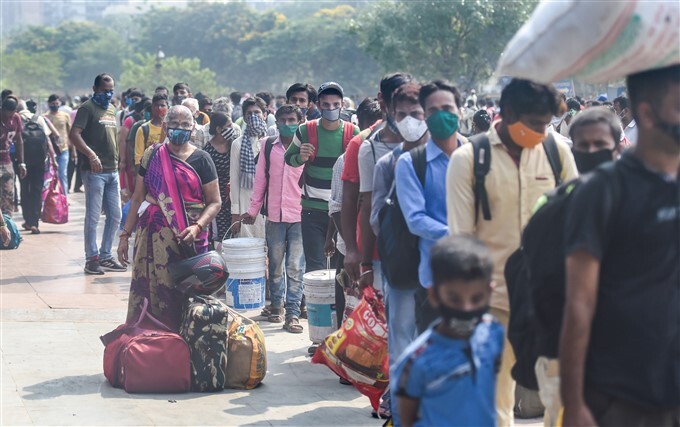 Passengers at Lokmanya Tilak Terminus to board outstation trains, in Mumbai
