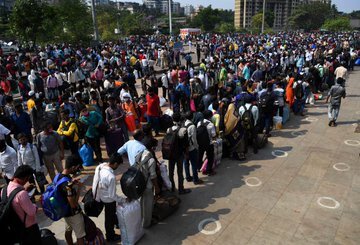 Passengers at Lokmanya Tilak Terminus in Mumbai