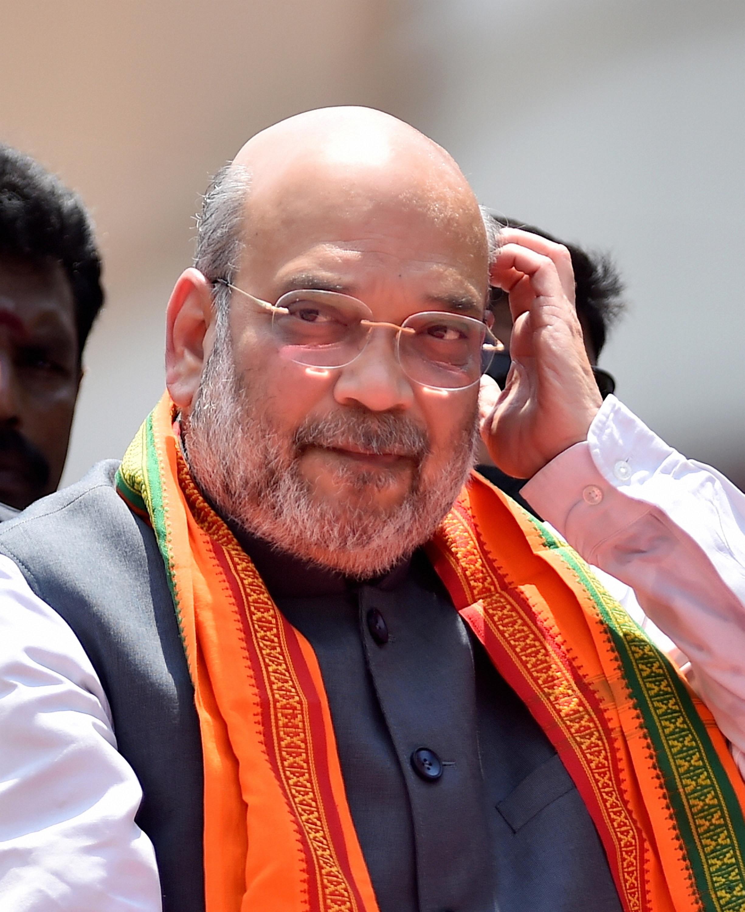 കേന്ദ്ര മന്ത്രിയും ബിജെപി നേതാവുമായ അമിത് ഷാ കോഴിക്കോട്ട് സംഘടിപ്പിച്ച റോഡ്‌ഷോയില്‍, ചിത്രങ്ങൾ കാണാം