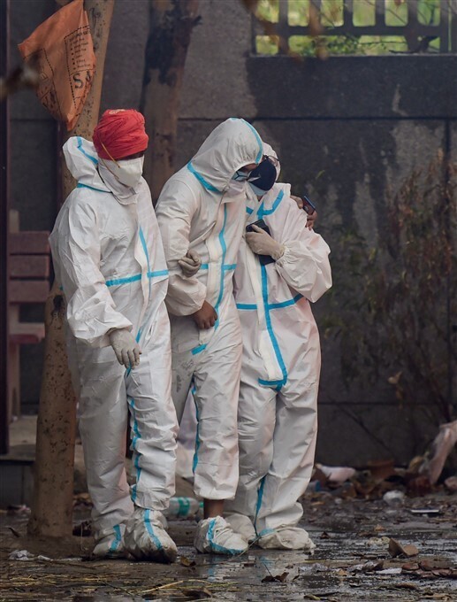 ಚಿತ್ರಗಳು: ಕೋವಿಡ್ 19ನಿಂದ ಮೃತಪಟ್ಟವರ ಅಂತ್ಯಕ್ರಿಯೆ