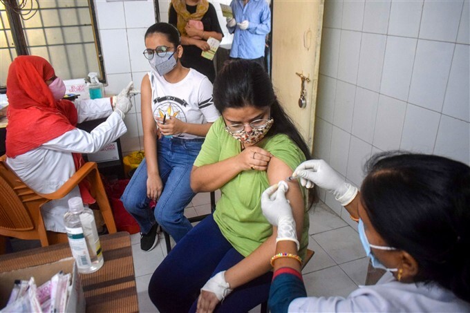 Covid-19 2nd wave: Citizens Receive COVID-19 vaccine During third phase Of vaccination Across Indian, 12/05/2021