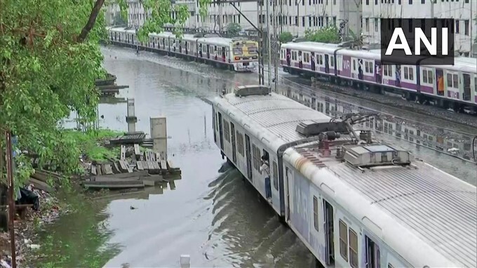 Flooded Roads And Railway Track Due To Heavy Rain In Mumbai
