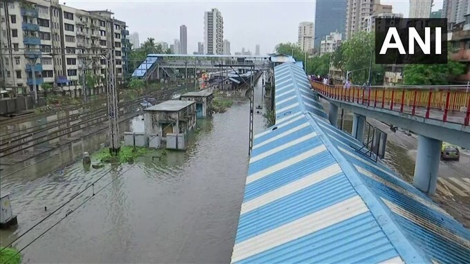 Flooded Roads And Railway Track Due To Heavy Rain In Mumbai