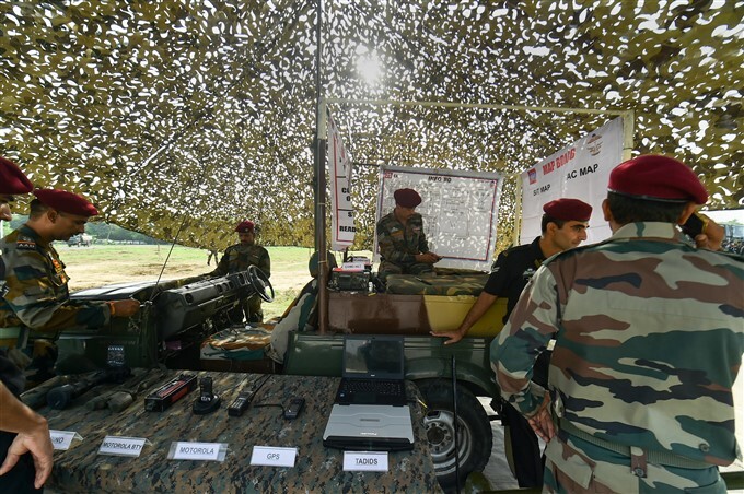 Para Brigade personnel perform during combat free fall by 75 paratroopers at BOC Ground in Agra