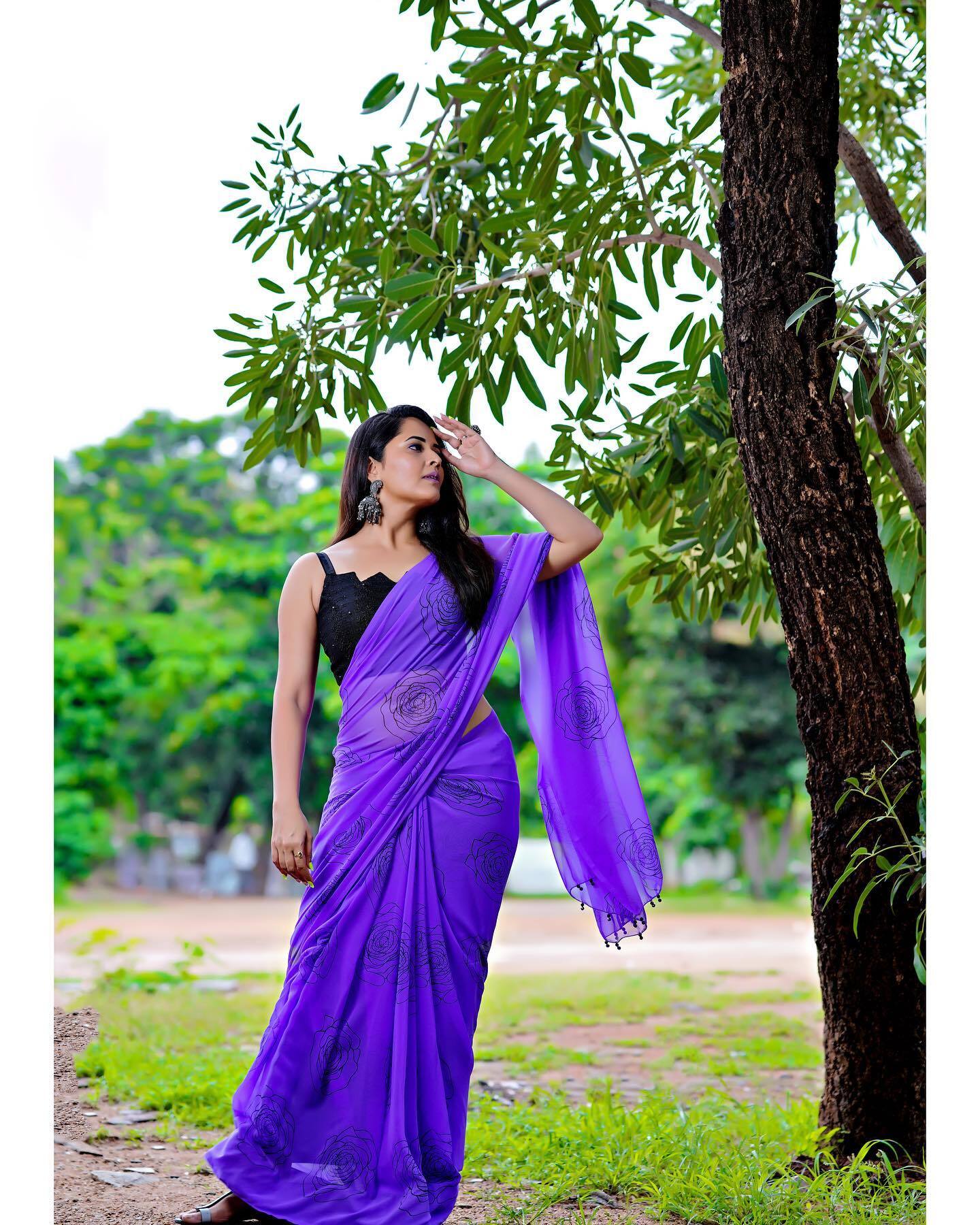 Anasuya:వంగపండు రంగు చీరలో  రంగమ్మత్త సూపరో సూపరు..!! (ఫోటోలు)