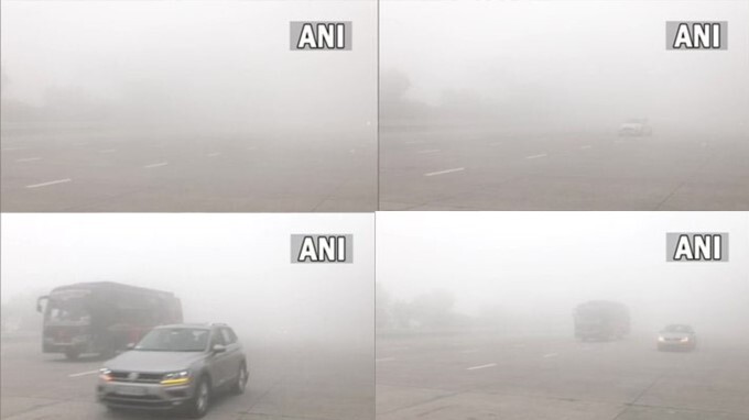 The thick layer of fog affects visibility at Yamuna Expressway