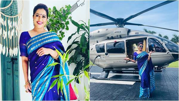 ഹെലികോപ്റ്ററിനു മുന്നില്‍ നിന്നും ഒരു വൈറൈറ്റി പോസ് ആയാലോ? നീല സാരിയില്‍ അതീവസുന്ദരിയായി രഞ്ജിനി ഹരിദാസ് 