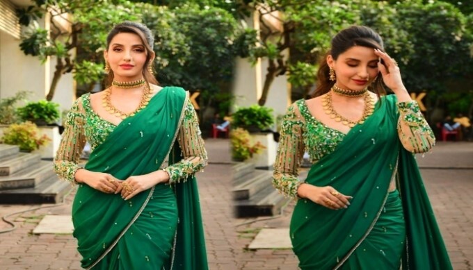 Bollywood Actress Nora Fatehi Looks Stunning In Green Saree