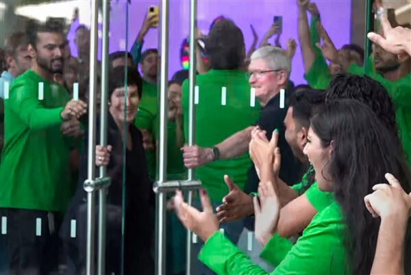 People visit India's first Apple retail store after its opening, at BKC in Mumbai