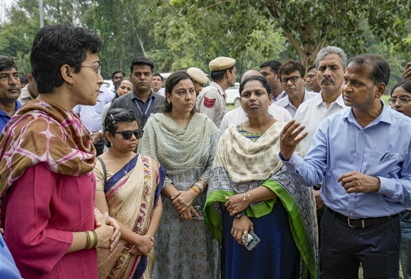 People from low-lying areas around the Yamuna river relocating to a safer place