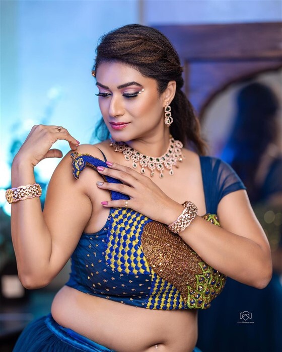 Actress Tanisha Kuppanda looks bold and beautiful in peacock outfit new photos