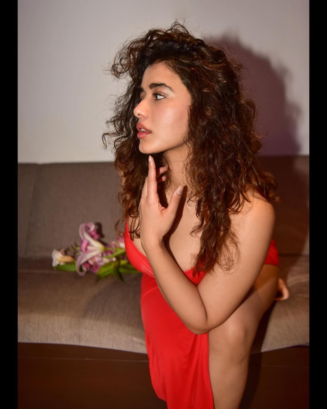 Ketika Sharma mesmerizes in a ravishing red dress, stealing the spotlight effortlessly.