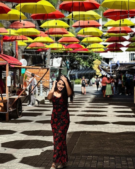 Anupama elegantly wandered the streets of Mauritius adorned in a breathtaking floral bodycon dress.
