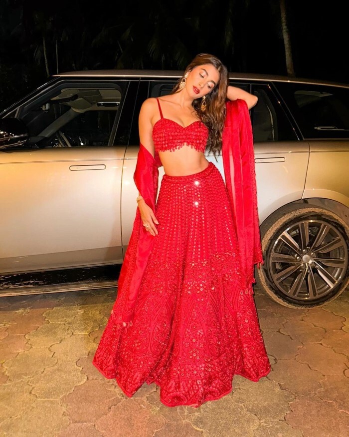 Pooja Hegde in Red Lehenga