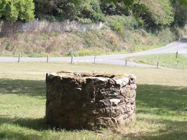 a well at the door of the house