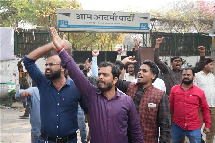 AAP supporters raise slogans against the arrest of Delhi Chief Minister Arvind Kejriwal