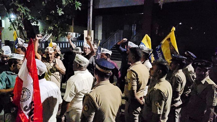 Aam Aadmi Party workers stage a protest against the arrest of Delhi Chief Minister Arvind Kejriwal