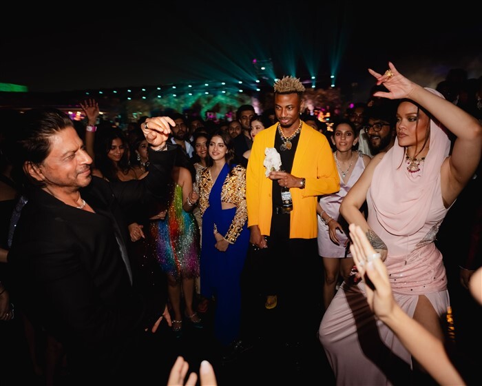 Rihanna & Shah Rukh Khan caught in a candid moment at the pre-wedding bash.