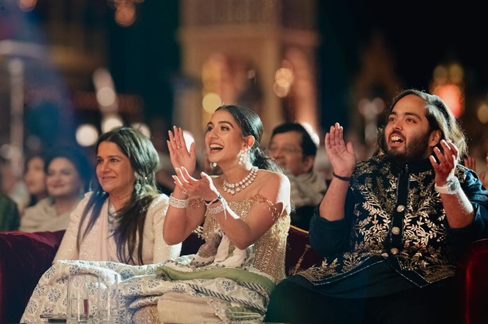 Anant Ambani and Radhika Merchant captured having a great time at the pre-wedding bash.