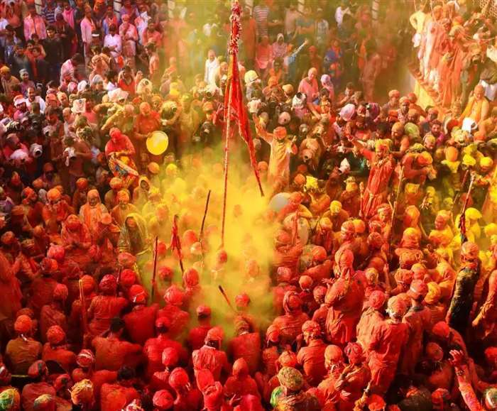 Lathmar Holi, celebrated in Barsana and Nandgaon, originates from the vibrant Braj region of Uttar P