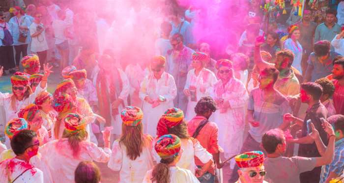 In Udaipur, known as the City of Lakes, a majestic Holi celebration reflects the splendor of its roy
