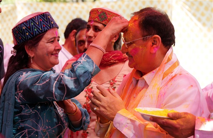 JP Nadda with party candidate for Lok Sabha elections Bansuri Swaraj during Holi celebrations