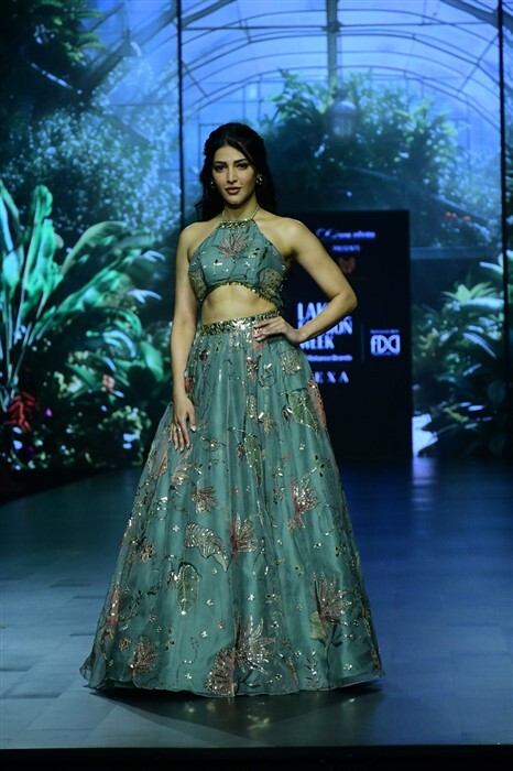 Shruti Haasan walked the ramp in a teal lehenga