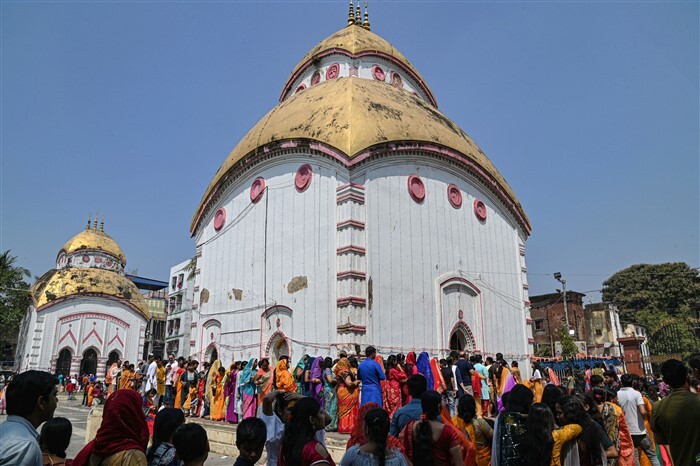 Devotees wait in queues to offer prayers to Lord Shiva at the Bhukailash temple