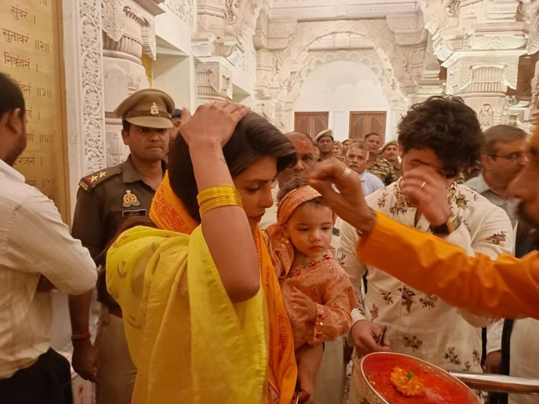 Priyanka wore a stunning yellow saree while Nick wore a white printed kurta and Malti in ethnic