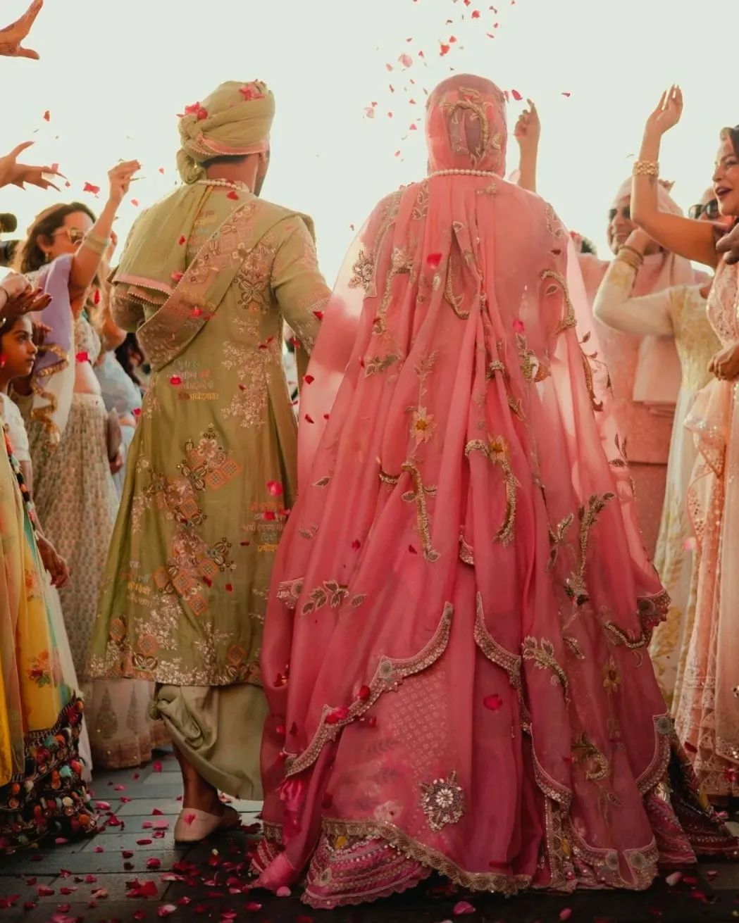 riti looked resplendent in a rose-colored lehenga, while Pulkit sported a dashing mint green sherwan