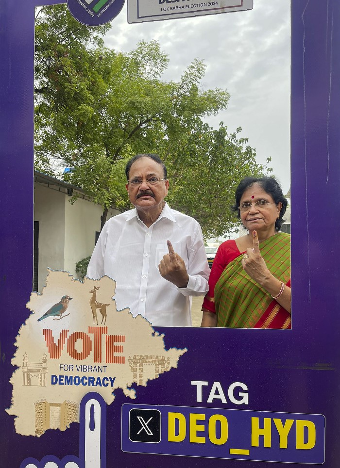 Hyderabad: Former Vice President M Venkaiah Naidu and his wife Usha show their inked fingers after casting votes