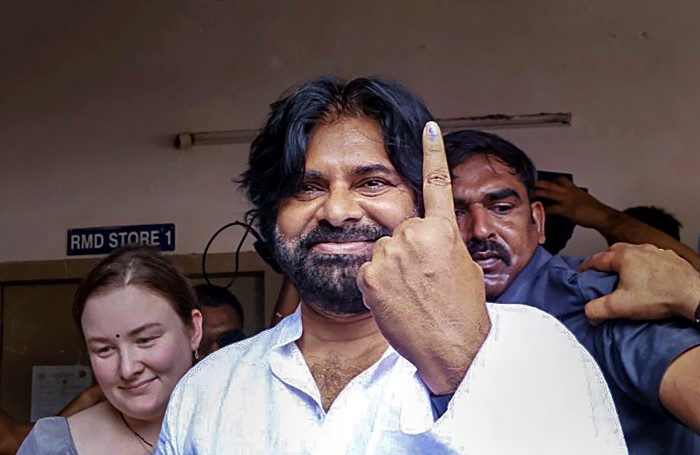 Mangalagiri: Jana Sena Party President Pawan Kalyan shows his inked finger after casting vote