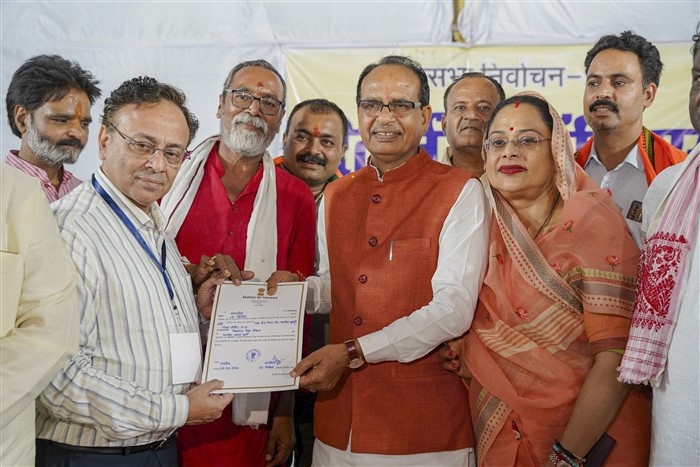 BJP leader and candidate from Vidisha constituency Shivraj Singh Chouhan receives certificate at a counting center after winning the Lok Sabha elections, in Raisen.
