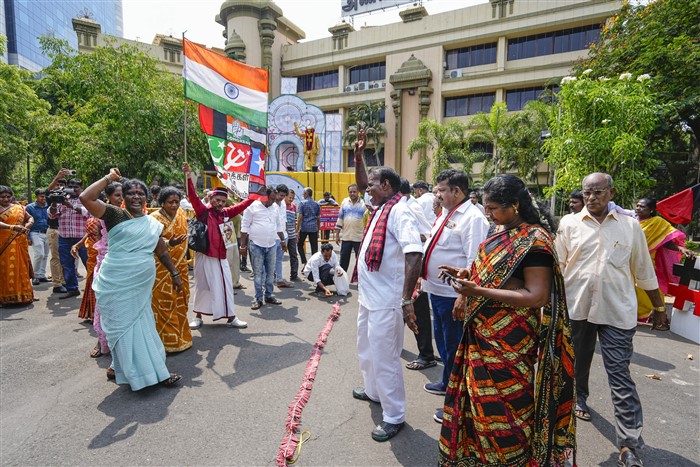 DMK supporters celebrate the party's lead during counting of votes for Lok Sabha elections, at party headquarters, Anna Arivalayam, in Chennai.