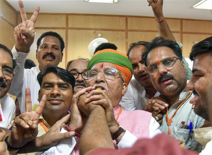 BJP candidate Arjun Ram Meghwal being offered sweets by party workers on the day of counting for Lok Sabha elections, in Bikaner.