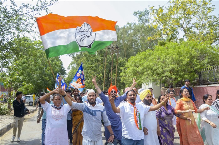 Congress party supporters celebrate the party's gain in the Lok Sabha elections on the day of counting of votes, in Chandigarh.