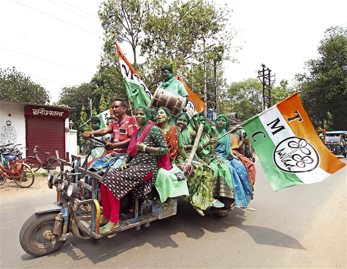 TMC supporters celebrate the party's lead during counting of votes for Lok Sabha elections, in Birbhum district.