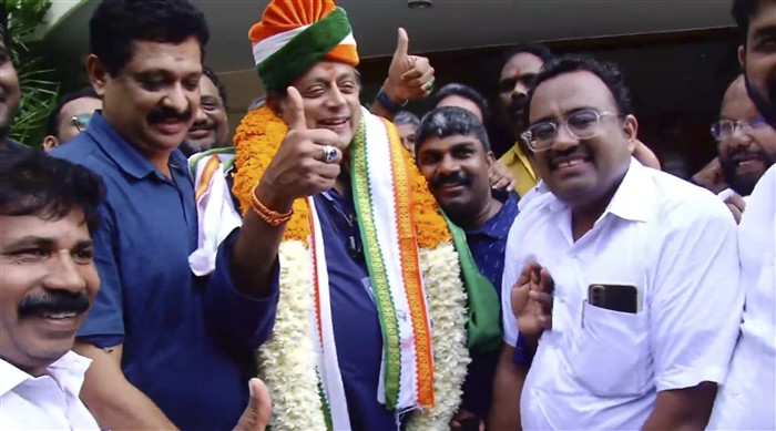 Congress leader Shashi Tharoor with supporters during celebrations of the party's lead in the Lok Sabha elections as counting of votes underway, in Thiruvananthapuram.