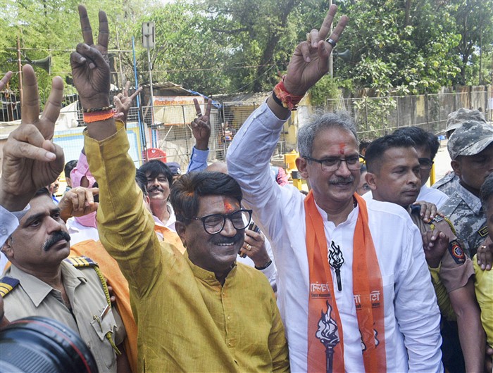 Mahavikas Aghadi candidates from South Mumbai and South Central Mumbai Arvind Sawant and Anil Desai celebrates their win in Lok Sabha polls, outside a counting centre, in Mumbai.