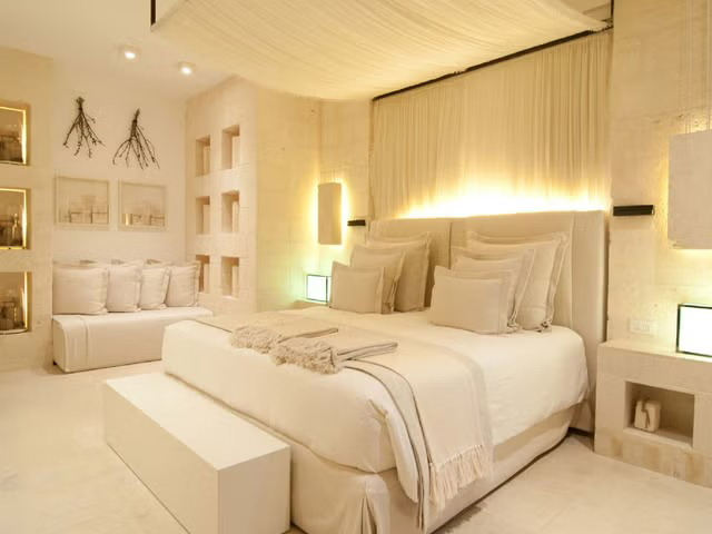 local craftsmanship shines through hand-painted ceramics, intricate mosaics, and woven textiles.