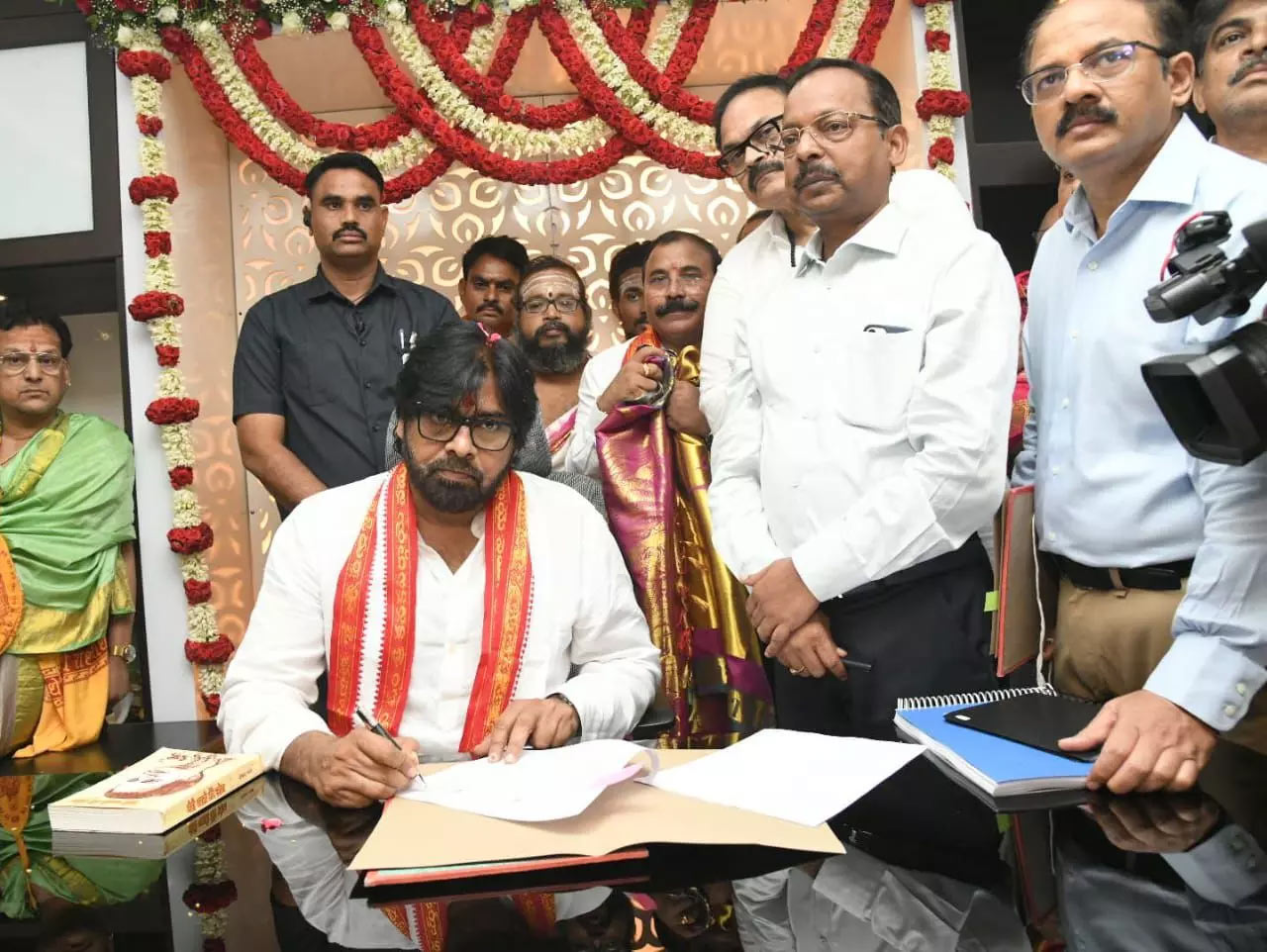 Pawan Kalyan signed two important files. One file focused on linking garden works to the Employment Guarantee scheme and releasing related funds.