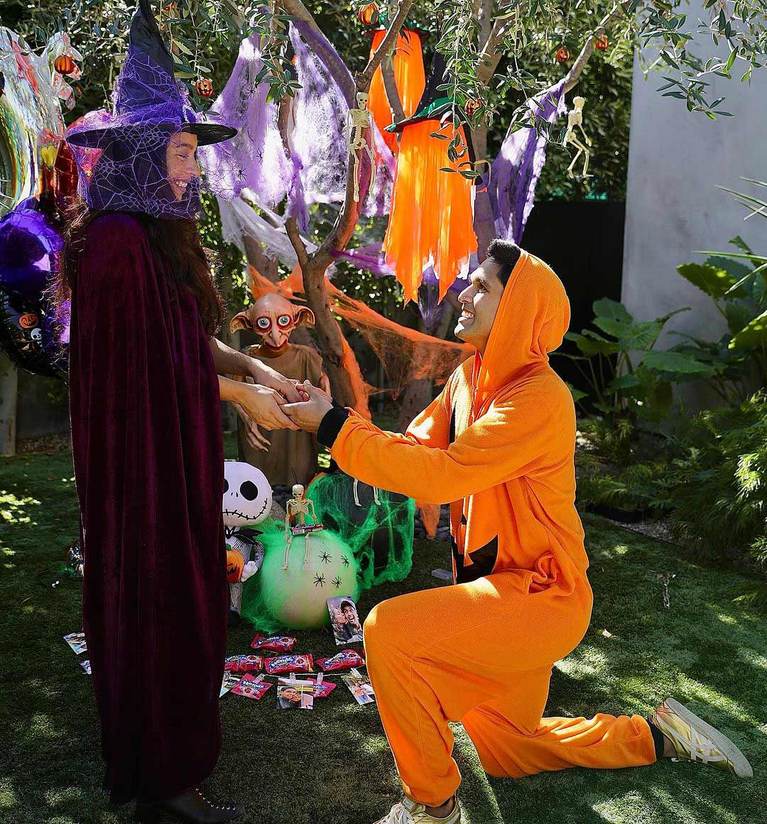 Sid kneeling to propose