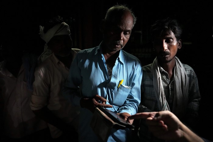 Relatives of victims of the Hathras stampede at Sikandra Rao community health centre in Hathras.
