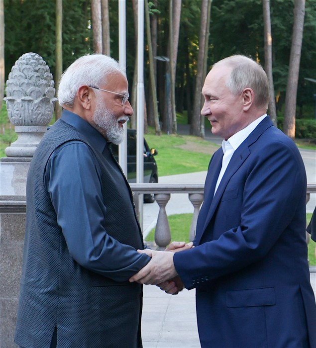 Prime Minister Narendra Modi welcomed by Russian President Vladimir Putin at his official residence at Novo-Ogaryovo for a private engagement, in Moscow.